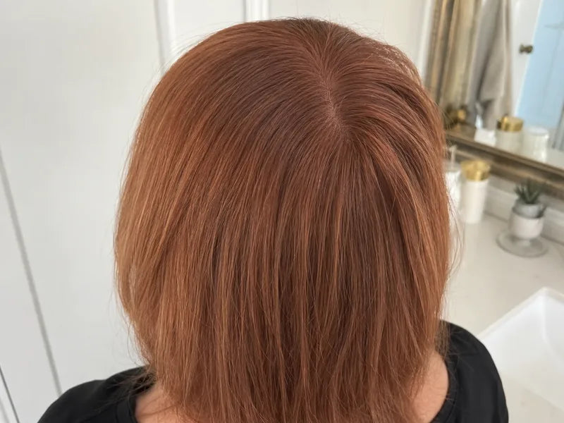 Denise M. auburn bathroom part coverage after using Standora hair density powder