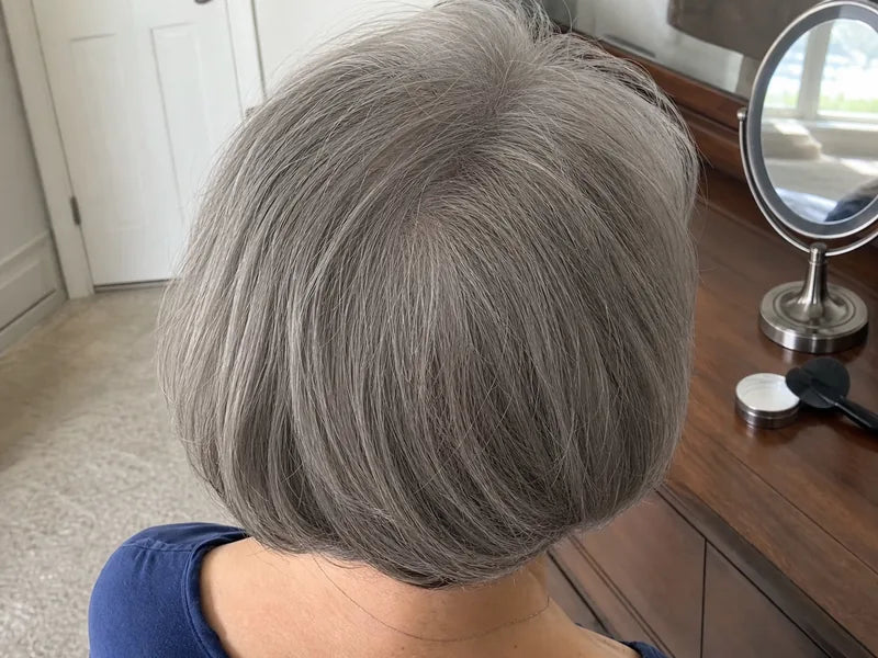 Ruth A. gray bob mirror touch-up result after using Standora hair density powder
