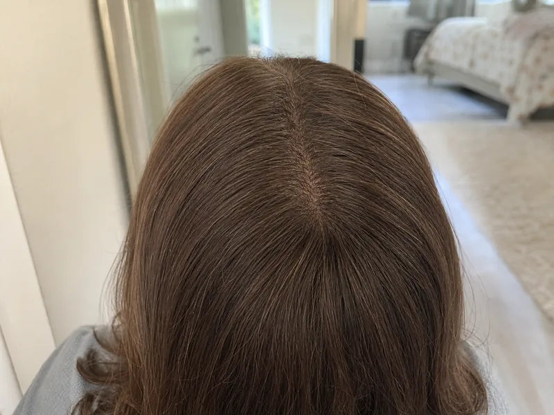 Sandra M. center part filled in while wearing her hair down